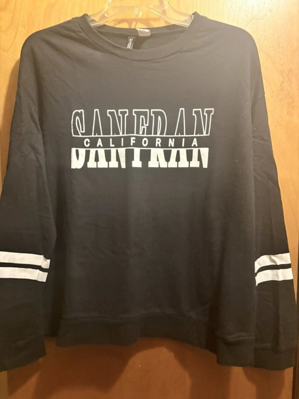 H&M Divided Shirt Women’s Large Black Graphic Pullover Shirt